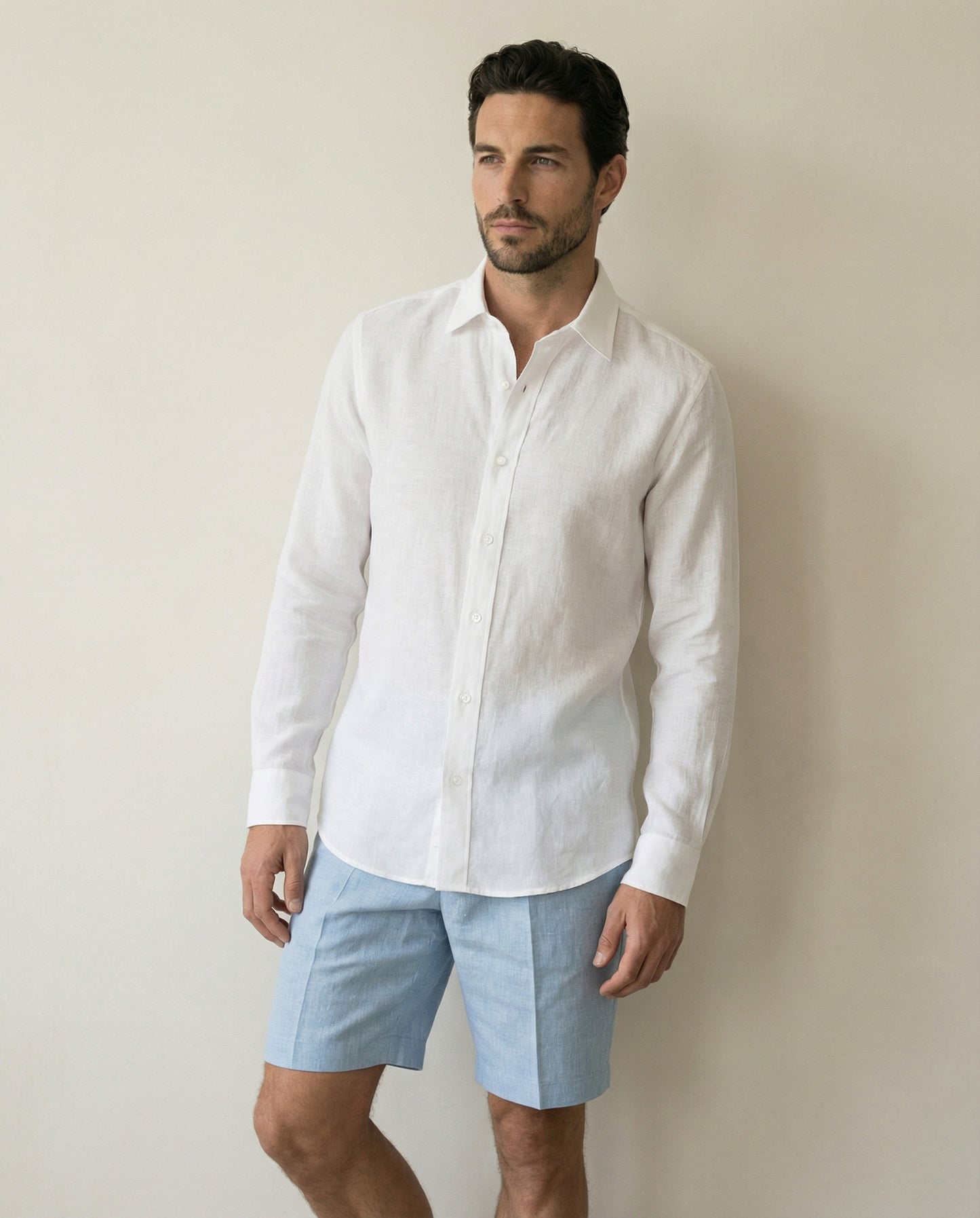 White Akoya linen shirt worn with tailored summer shorts