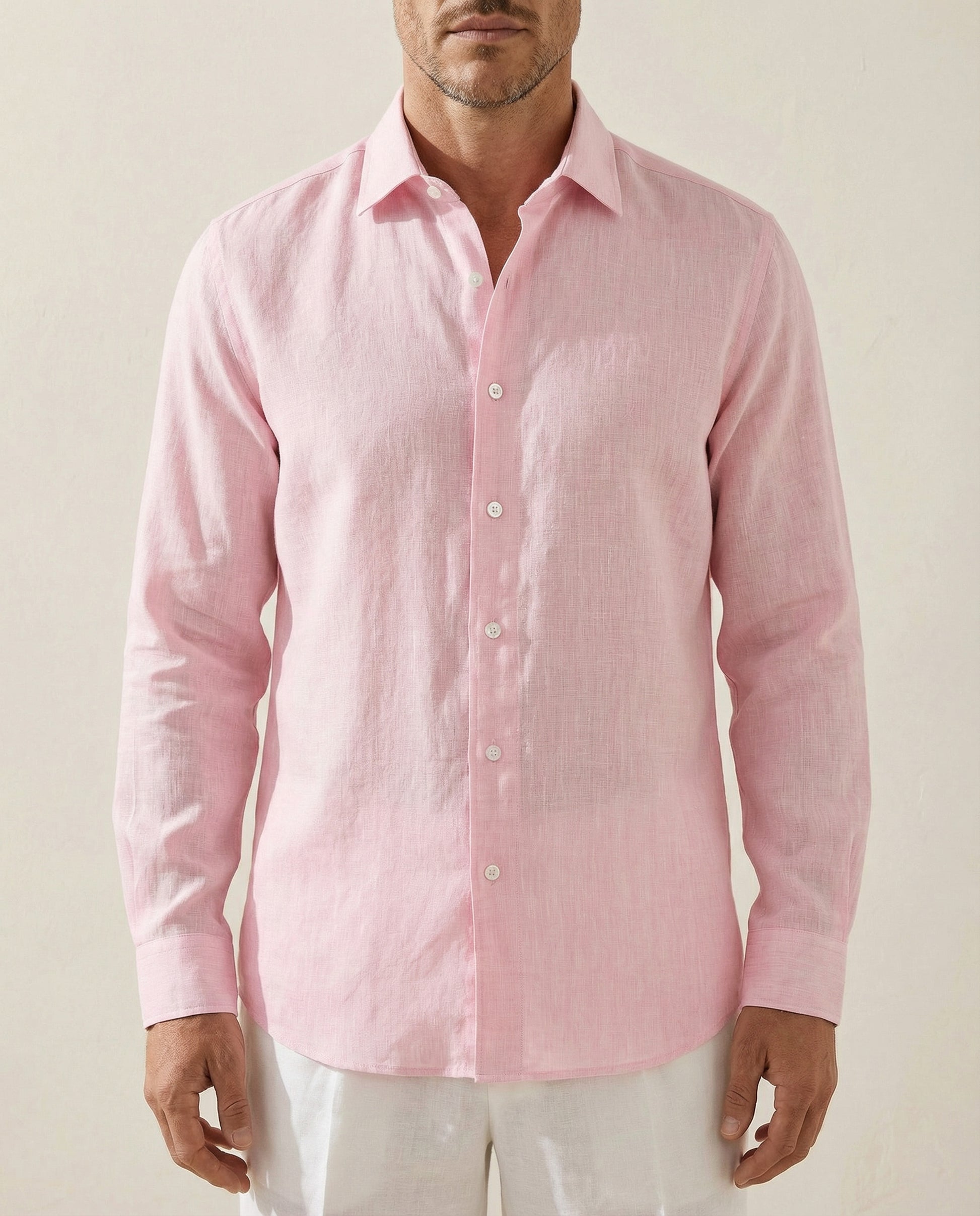Mid view of men’s coral baby pink linen shirt showing fit and drape