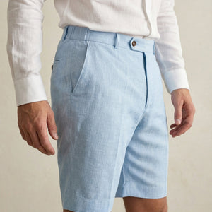 Side view of men’s light blue linen shorts with tailored fit