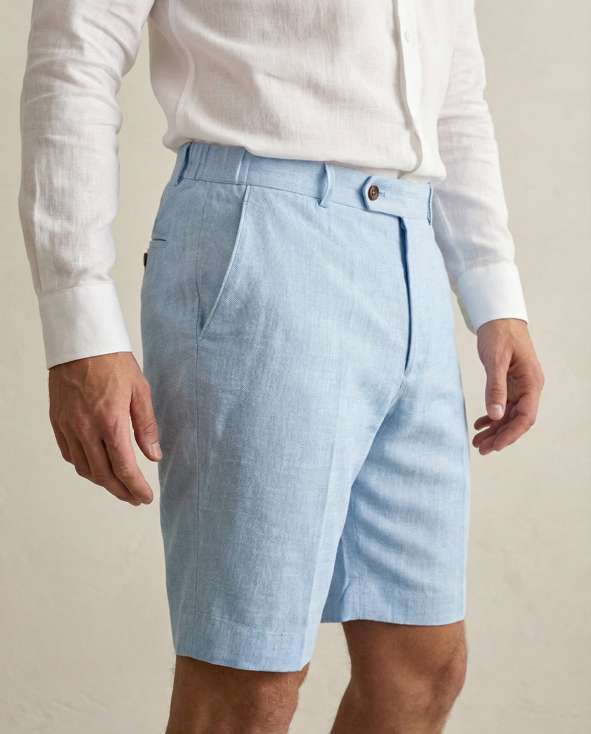 Side view of men’s light blue linen shorts with tailored fit