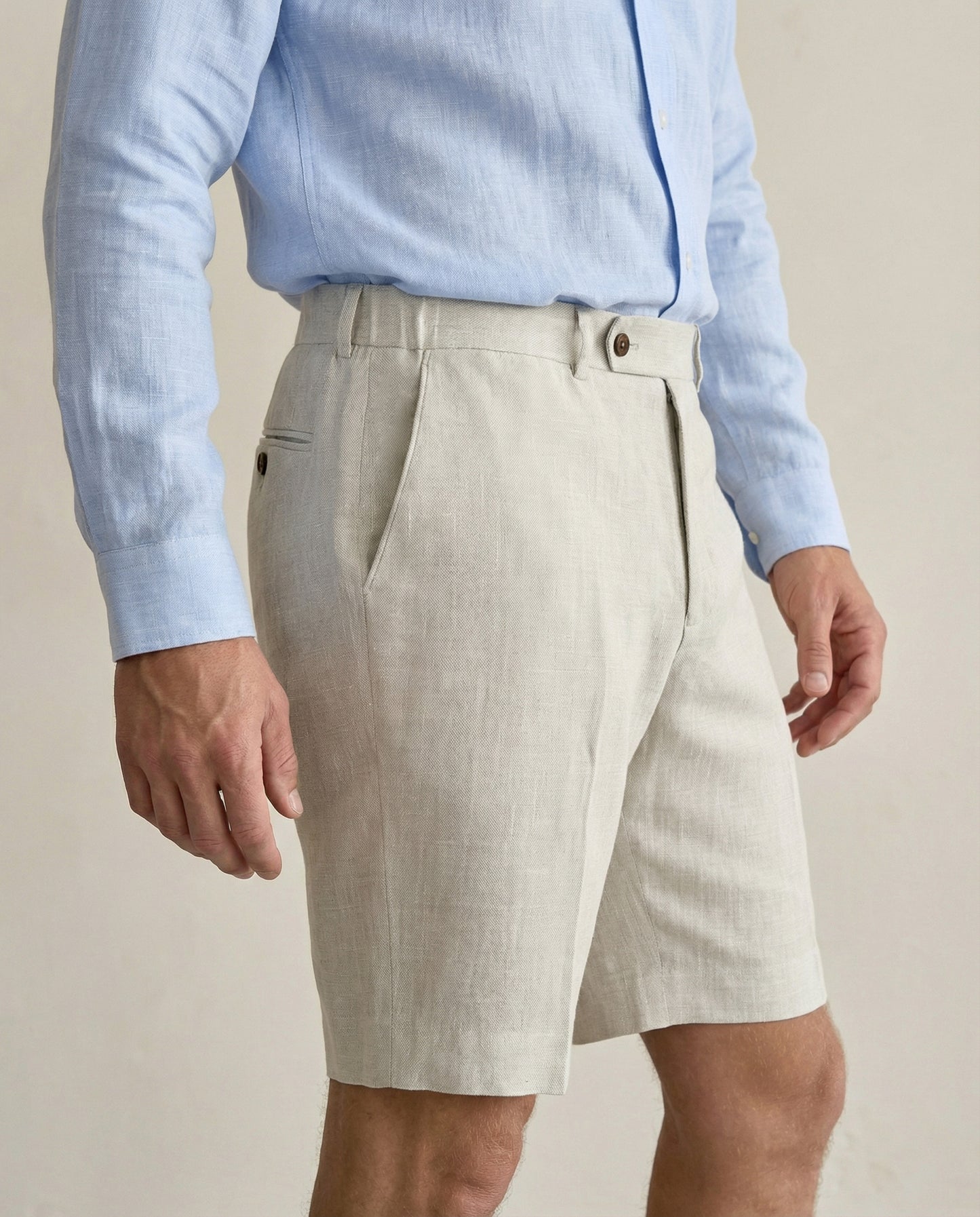 Side view of men’s natural linen shorts with tailored fit