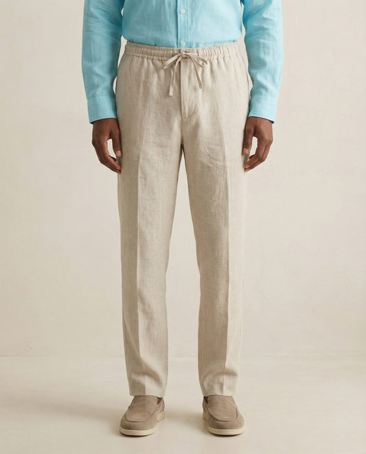 Front view of men’s natural linen trousers with drawstring waist