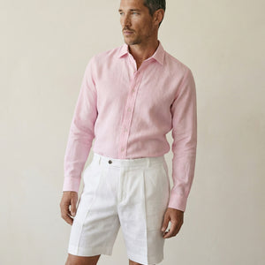 Front view of men’s pearl white linen shorts