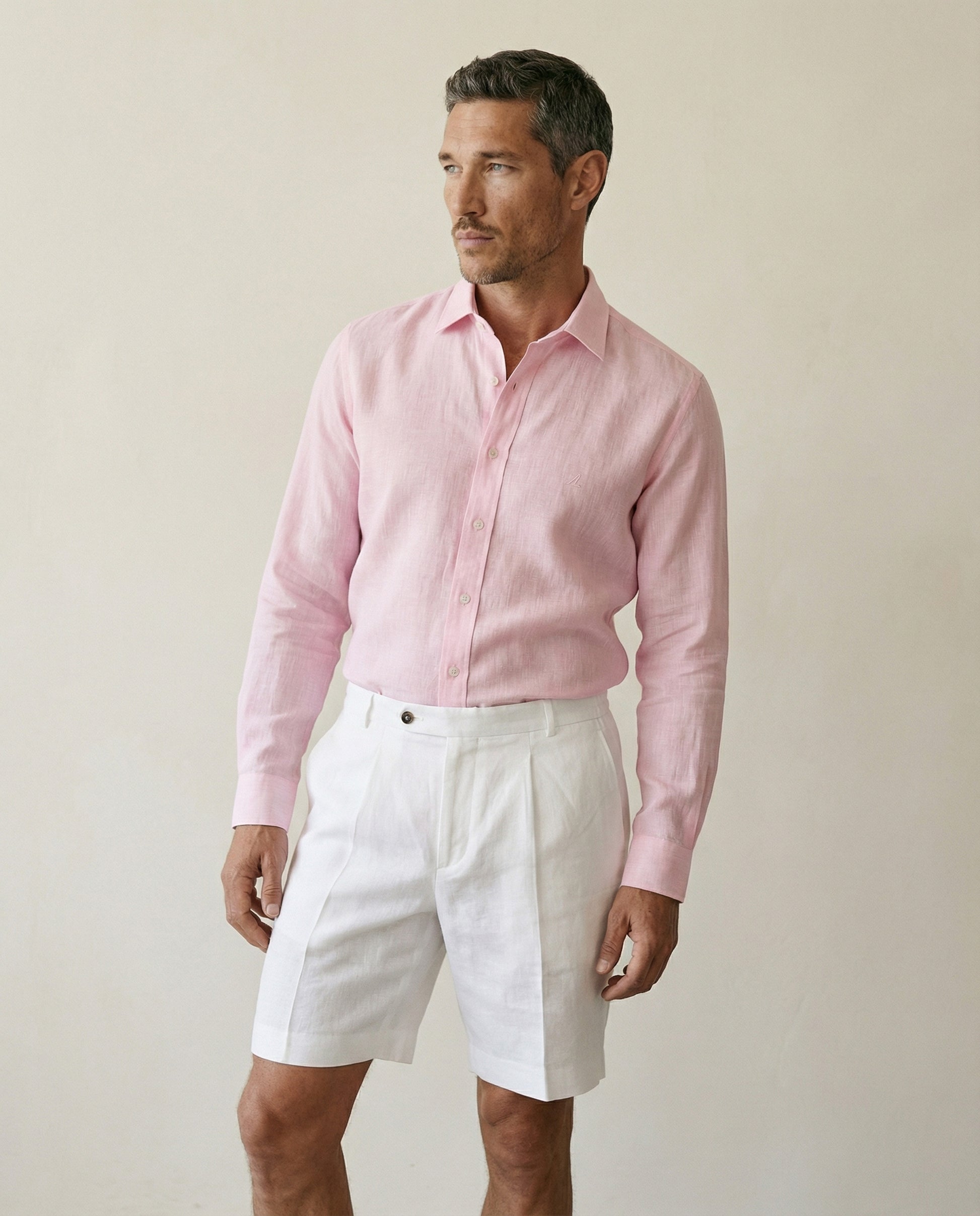 Front view of men’s pearl white linen shorts