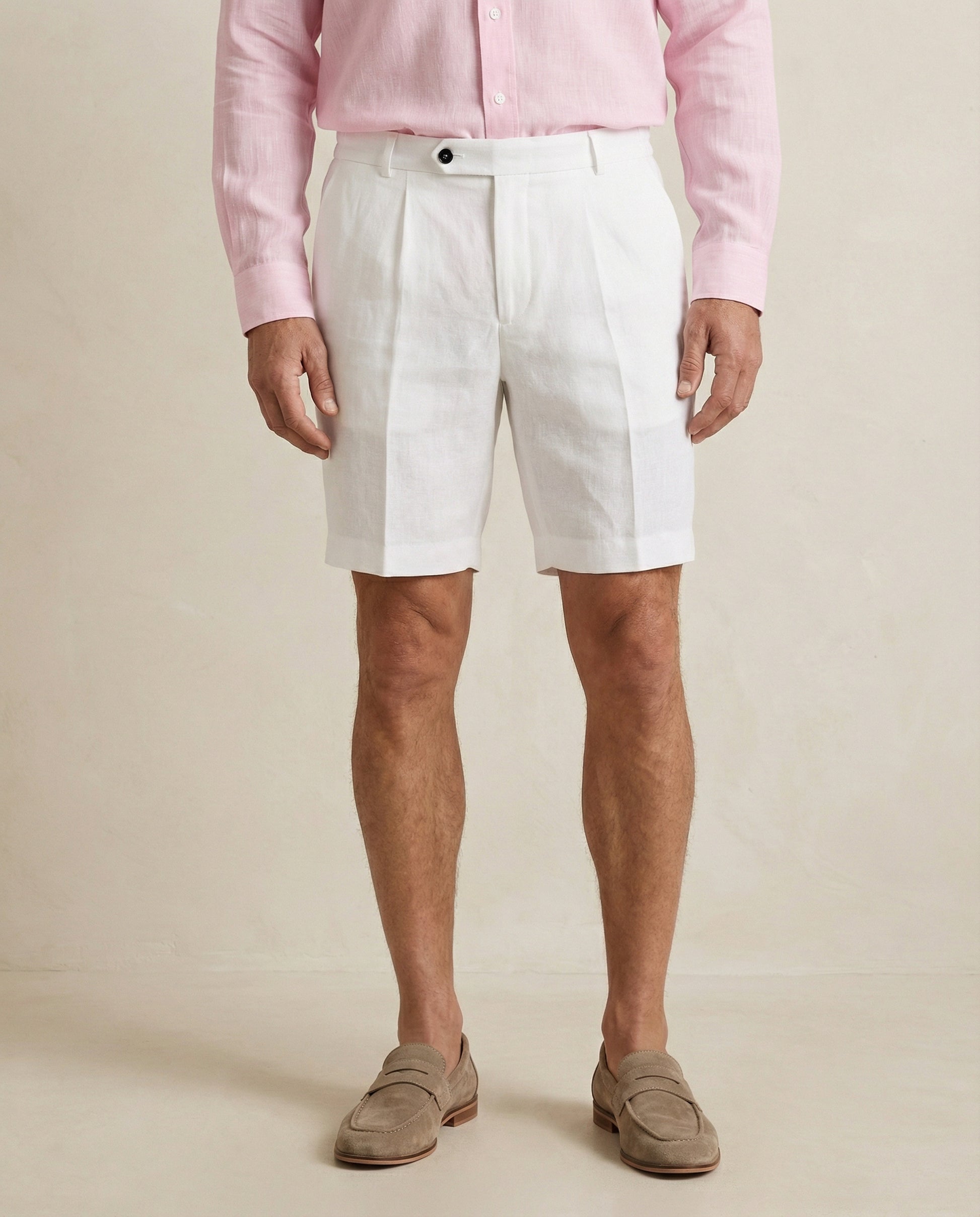 Close-up of linen fabric and construction on men’s pearl white shorts