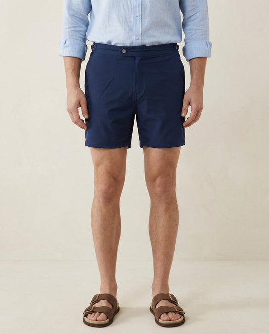 Riviera navy swim shorts by Apprivió in deep navy tone with side buckle fastening.