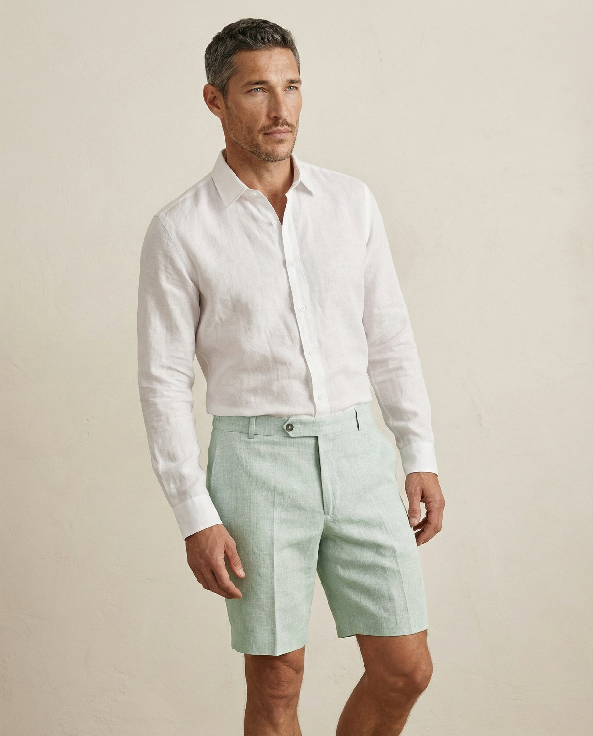 Front view of men’s sage green linen shorts