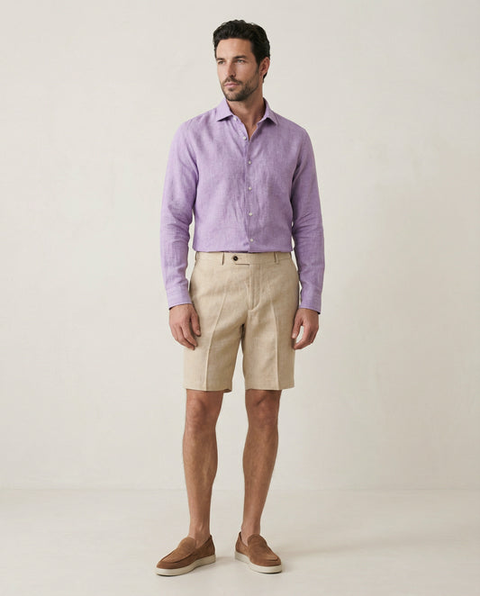 Men’s Senna beige linen shorts worn with purple linen shirt, full outfit view