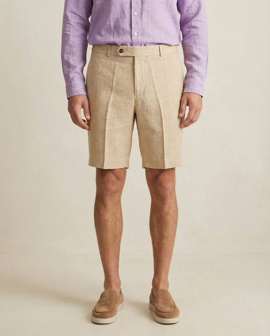 Detail of waistband and button closure on men’s linen shorts