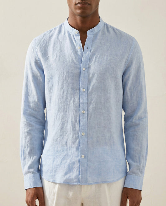 Detail view of light blue linen Chinese collar shirt with button placket