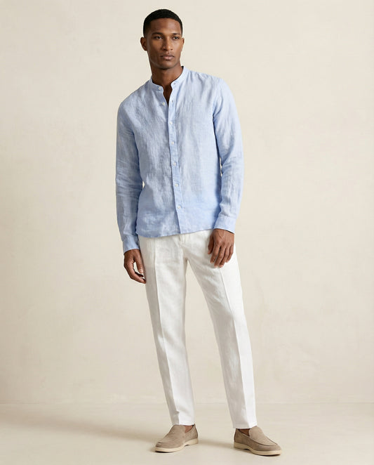 Full body view of men’s light blue linen Chinese collar shirt