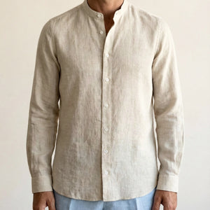 Close-up detail of men’s natural linen shirt with Chinese collar