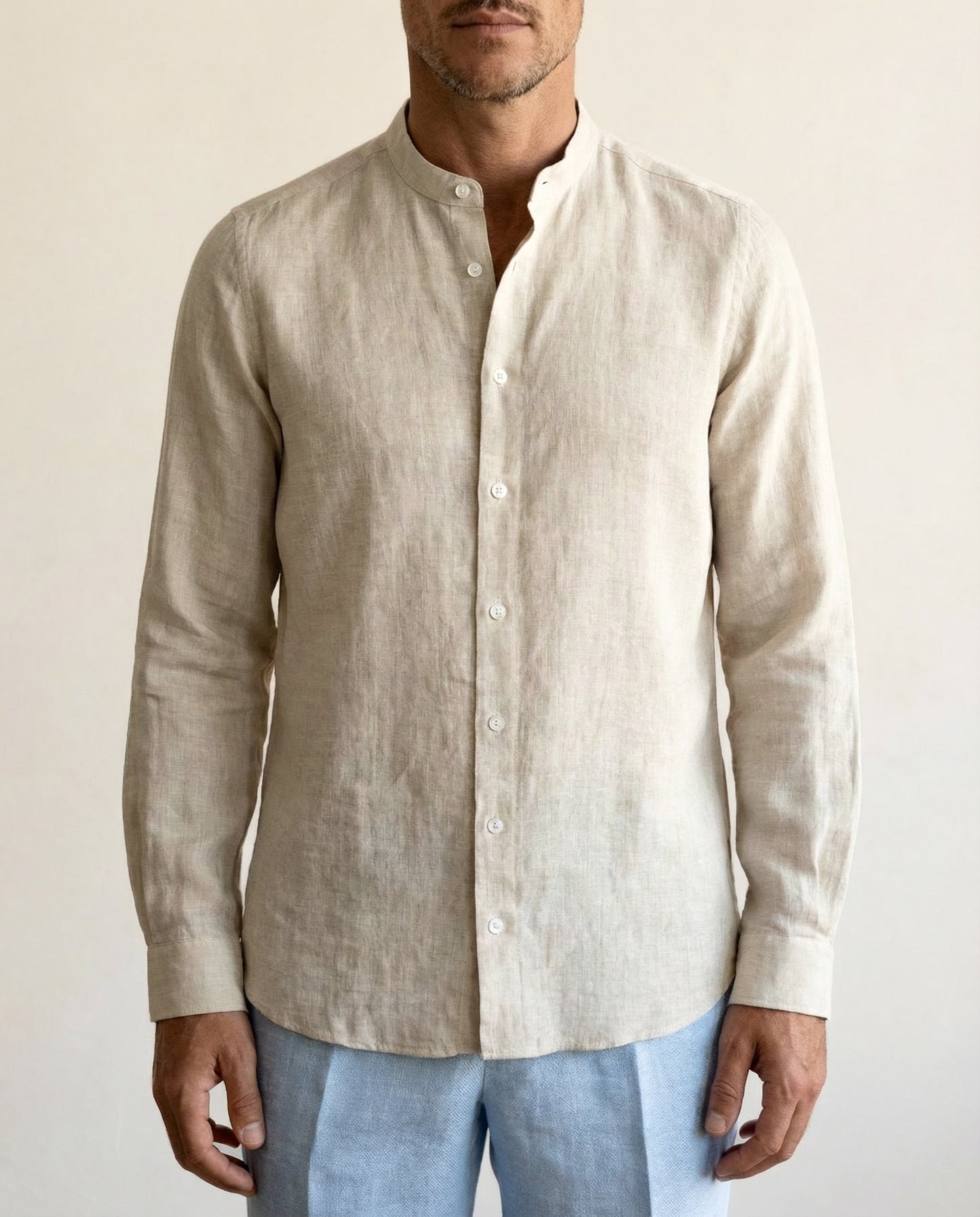Close-up detail of men’s natural linen shirt with Chinese collar